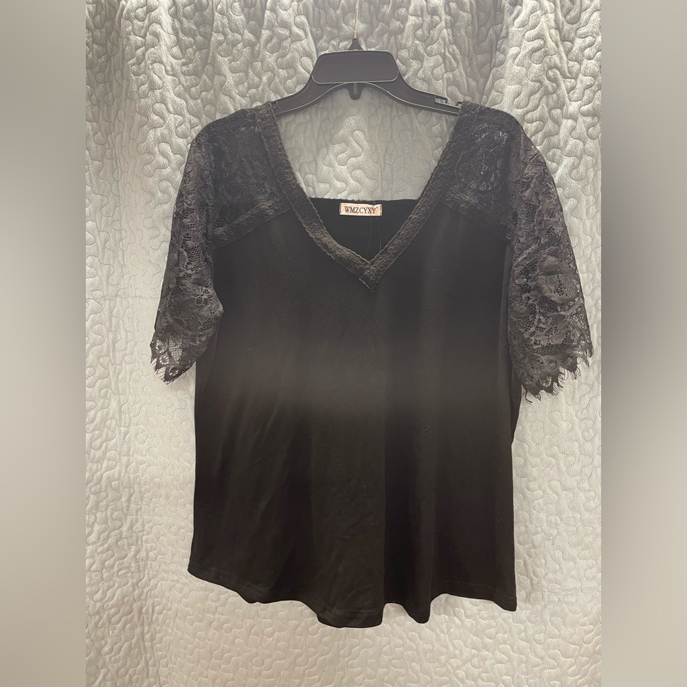 V-neck blouse with lace sleeves